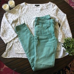 American Eagle mint green skinny jeans